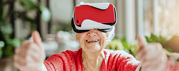 Grandma having fun using a VR headset